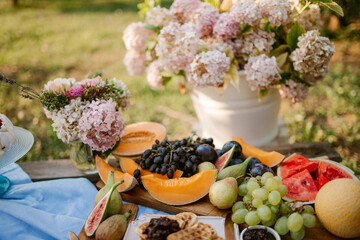 Wooden board with summer fruit