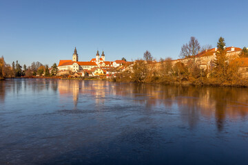 View of the city of Telc in the winter sunset..The picturesque castle and the historic center with the decorative facades of the houses belong to the UNESCO World Heritage Site, Czech Republic.