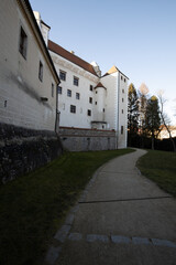 Castle Park and Telc Castle. View of the city of Telc in the winter sunset.
The picturesque castle and the historic center with the decorative facades of the houses belong to the UNESCO World Heritage