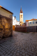 View of the city of Telc in the winter sunset.
The picturesque castle and the historic center with the decorative facades of the houses belong to the UNESCO World Heritage Site, Czech Republic.