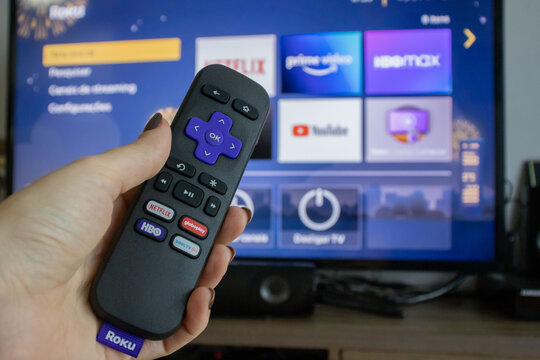 Vila Velha, Espirito Santo, Brazil - 12292021 - Roku Express, TV box device with streaming service in Brazil and infrared remote control - with HBO Max, "Globoplay", Netflix, Spotify and others.