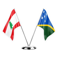 Two table flags isolated on white background 3d illustration, lebanon and solomon islands