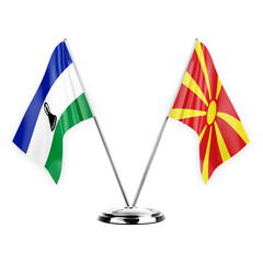 Two table flags isolated on white background 3d illustration, lesotho and north macedonia