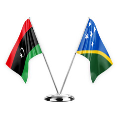 Two table flags isolated on white background 3d illustration, libya and solomon islands