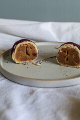Baked sweet potato, made from mochi bread with Purple Sweet Potato inside. Food photography concept for background