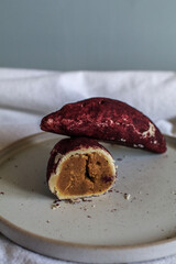 Baked sweet potato, made from mochi bread with Purple Sweet Potato inside. Food photography concept for background