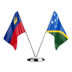 Two table flags isolated on white background 3d illustration, liechtenstein and solomon islands