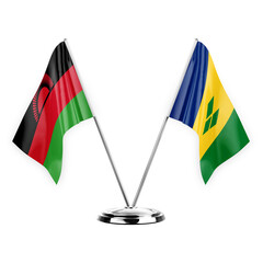 Two table flags isolated on white background 3d illustration, malawi and saint vincent and the...