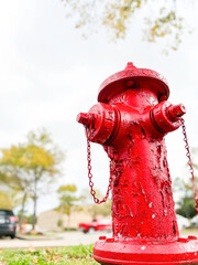 Fire hydrant on the ground. Close up to The old fire hydrant with broken chain in katy Texas, for emergency , in red color.