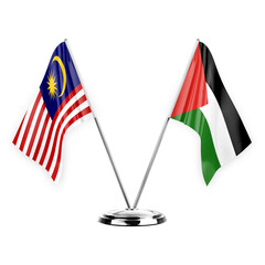 Two table flags isolated on white background 3d illustration, malaysia and palestine