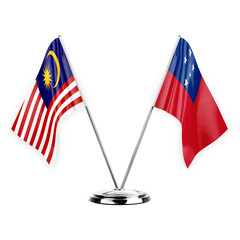Two table flags isolated on white background 3d illustration, malaysia and samoa