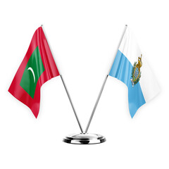 Two table flags isolated on white background 3d illustration, maldives and san marino