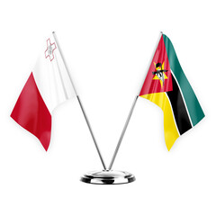Two table flags isolated on white background 3d illustration, malta and mozambique