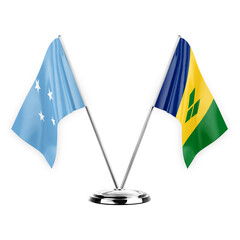 Two table flags isolated on white background 3d illustration, micronesia and saint vincent and the grenadines