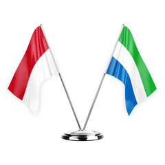 Two table flags isolated on white background 3d illustration, monaco and sierra leone