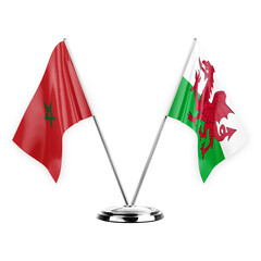 Two table flags isolated on white background 3d illustration, morocco and wales