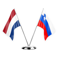 Two table flags isolated on white background 3d illustration, netherlands and slovenia