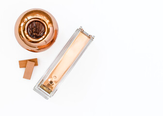 Rose gold office supplies on white background