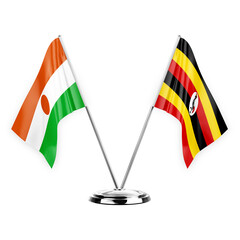 Two table flags isolated on white background 3d illustration, niger and uganda