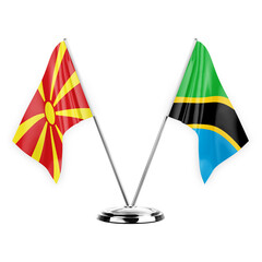 Two table flags isolated on white background 3d illustration, north macedonia and tanzania