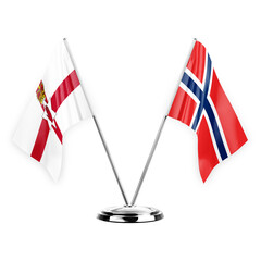 Two table flags isolated on white background 3d illustration, northern ireland and norway