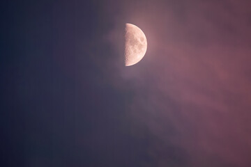 half moon in purple sky