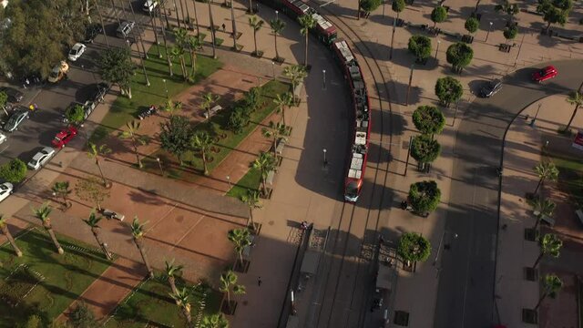Aerial view of a tramway arriving to the station in Casablanca