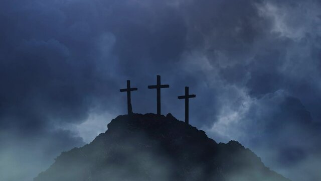 three crosses on a mountain silhouette against a thunderstorm dark cloud background