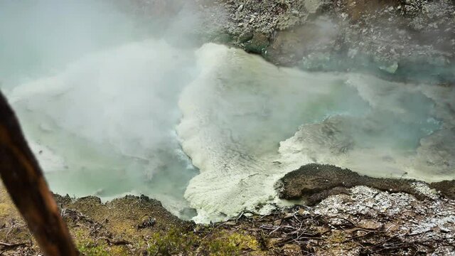 Top view of extreme boiling Lake in volcanic zone during daytime - Wai-O-Tapu,New Zealand