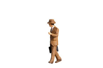 Miniature people businessman standing isolated on white background with clipping path