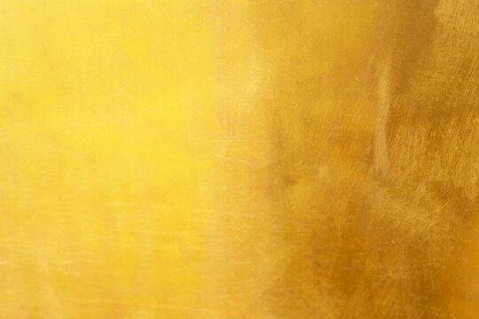Old glod metal wall background or texture and shadow