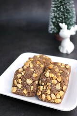 Homemade cashew nuts and chocolate chips cookies. Best tea time healthy baked biscuits. High Tea concept. Copy space.