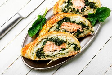 Salmon baked in dough.