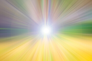 Bright flash of light with yellow, green and purple rays