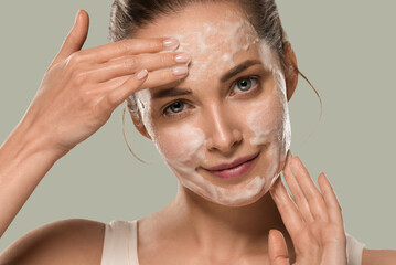 Soap face woman clean skin beauty. Color background. Green