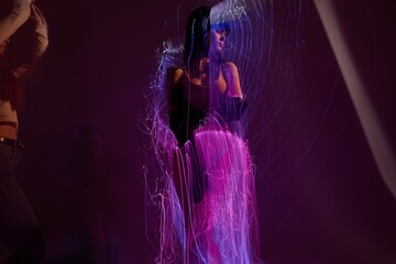 Pretty young female disco neon lines luxury fashion studio model unaltered