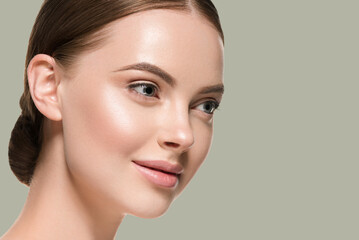 Skin care woman face with healthy beauty skin closeup cosmetic age concept. Color background green
