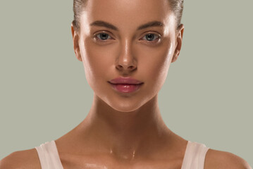 Beauty woman healthy skin natural make up clean fresh skin cosmetic concept color background green