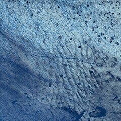 Frozen ground texture. Ice and snow. Cold surface during winter.