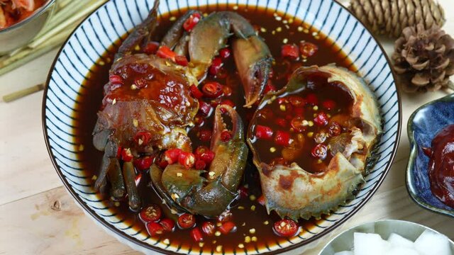 Korean spicy Fresh raw crabs marinated in a mild soy sauce, Ganjang gejang Korean traditional food