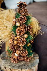 Christmas tree made of natural fir and pine cones. New Year. Christmas, home decor.