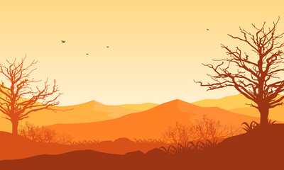 Stunning mountain view with dry tree sunrise from the lakeside at dusk in the afternoon