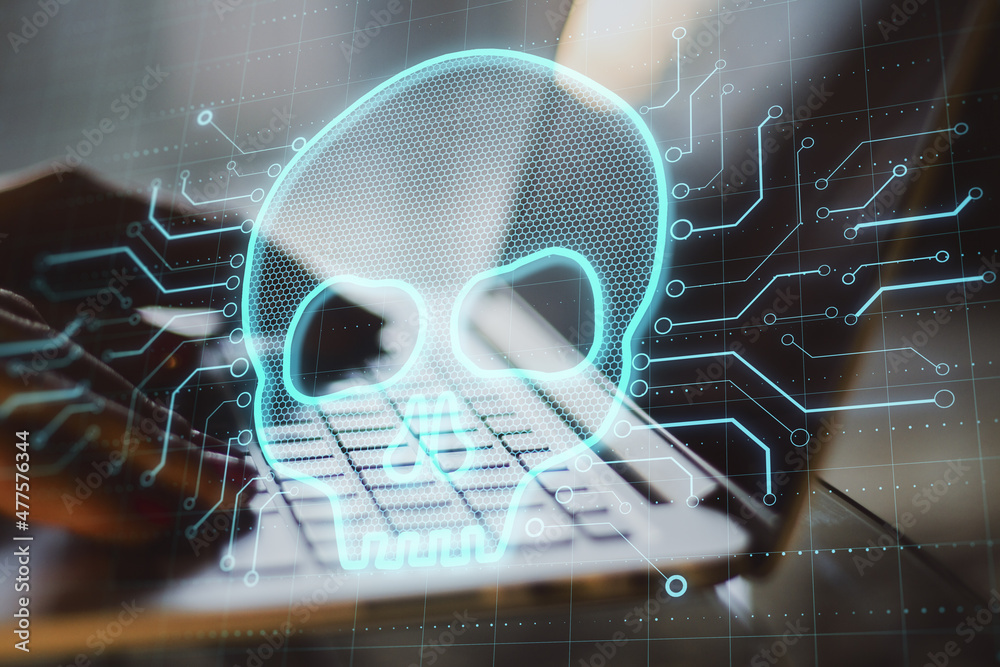 Poster close up of backlit hands using laptop with abstract glowing digital skull on blurry background. hac