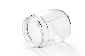 Empty glass jar isolated on white background. Container of food.