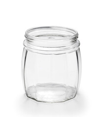 Empty glass jar isolated on white background. Container of food.