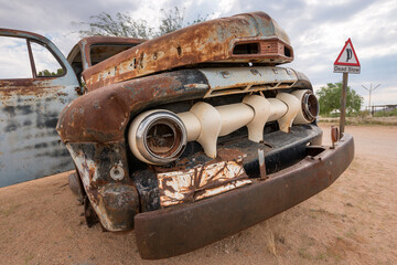 An abandoned vintage car wreck in Solitaire