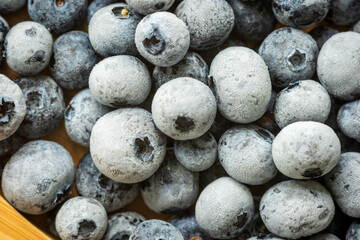 frozen ripe blueberries closeup background