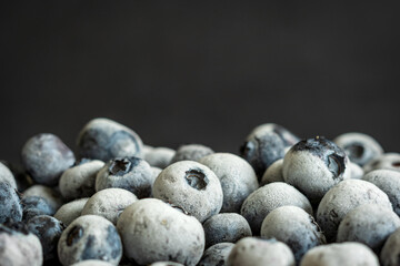 frozen ripe blueberries closeup background