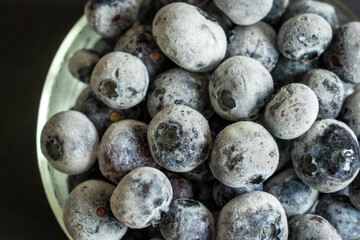 frozen ripe blueberries closeup background