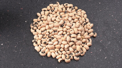 Uncooked black eyed peas. Health food concept.